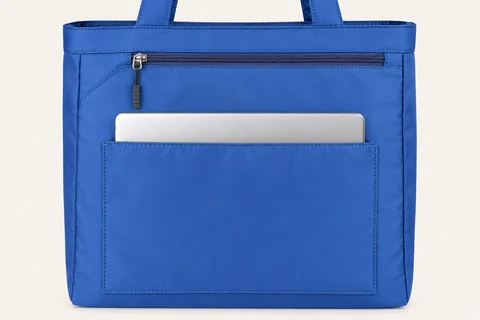 Rear panel slip pocket holding a laptop.