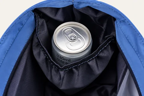 Right interior pocket holding a 330 ml can.